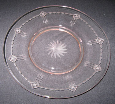 Unknown Cutting on Unknown Luncheon Plate