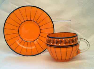 Unknown Orange and Black Cup and Saucer