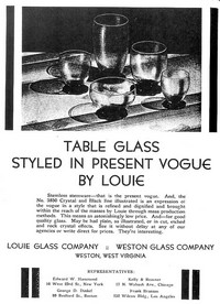 Louie Glass Table Glass Advertisement