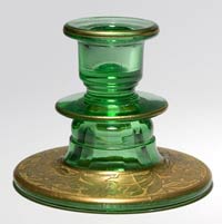 Unknown Green Candleholder with Unknown Trumpet Flower Decoration