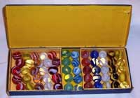 Akro Agate Tin Box with Corkscrew Marbles